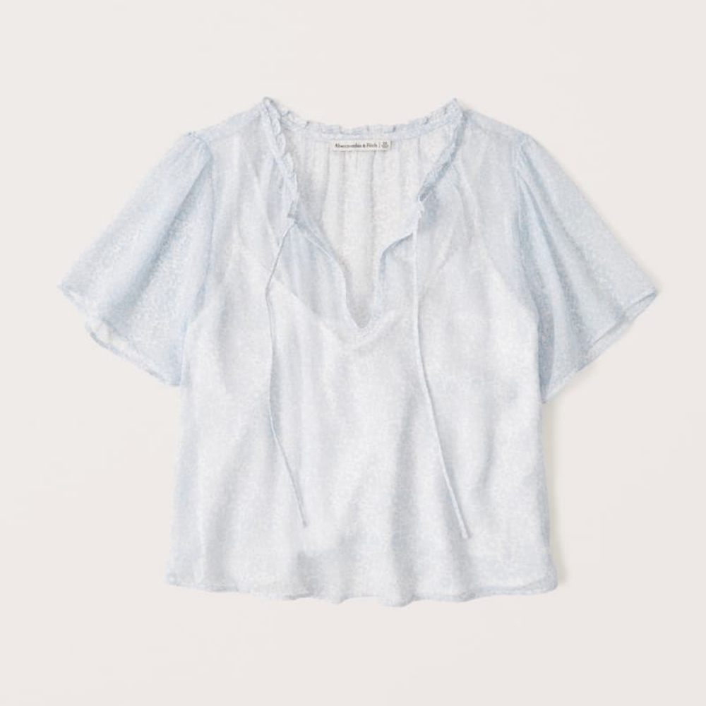 Light blue and white blouse